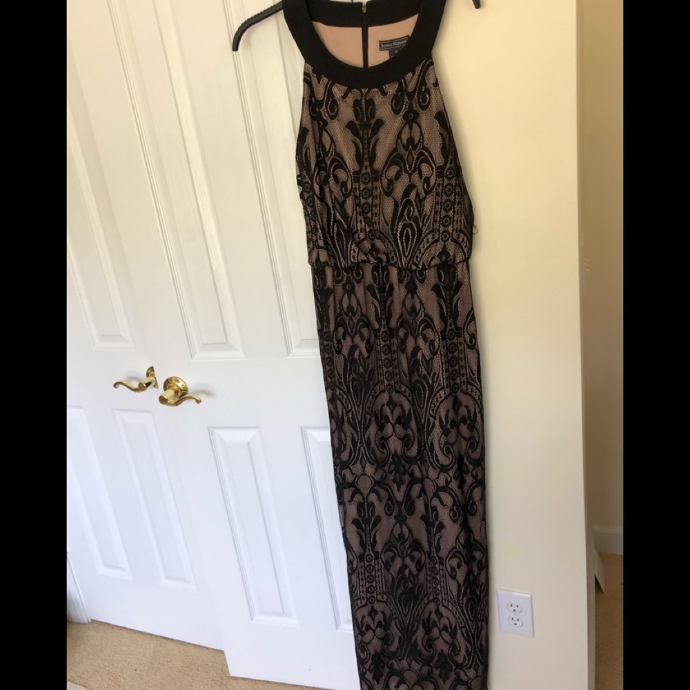 Black lace sleeveless evening dress in size 16.